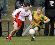 30 March 2008; PJ Quinn, Tyrone, in action against Brian Roper, Donegal. Allianz National Football League, Division 1, Round 5, Tyrone v Donegal, Edendork, Co Tyrone. Picture credit; Michael Cullen / SPORTSFILE