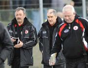 30 March 2008; Tyrone manager Mickey Harte, centre, walks off at half time. Allianz National Football League, Division 1, Round 5, Tyrone v Donegal, Edendork, Co Tyrone. Picture credit; Michael Cullen / SPORTSFILE