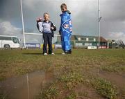 30 March 2008; Dublin supporters, 8 year old, Aidan Fitzgerald and, 11 year old, Cian O'Connor on the water logged pitch at St Oliver Plunkets Park, Crossmaglen. Allianz National Football League, Division 2, Round 5, Armagh v Dublin, Crossmaglen, Co. Armagh. Picture Oliver McVeigh / SPORTSFILE
