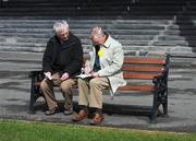 30 March 2008; Two punters read the race card before racing. The Curragh Racecourse, Co. Kildare. Picture credit; Ray McManus / SPORTSFILE