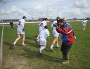 31 March 2008; Photographer Mel McDermott photographs the Kildare team as they make their way out. Allianz National Football League, Division 1, Round 5, Kildare v Mayo, St Conleth's Park, Newbridge, Co. Kildare. Picture credit: Brian Lawless / SPORTSFILE