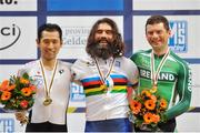 27 March 2015; Ireland's Eoghan Clifford, right, along side Masaki Fujita, left and Joseph Berenyi, centre. Clifford came third in the C3 3km Pursuit race with a time of 3:39.945. 2015 UCI Para-cycling Track World Championships. Omnisport Apeldoorn, De Voorwaarts 55, 7321 MA Apeldoorn, Netherlands. Picture credit: Jean Baptiste Benavent / SPORTSFILE