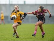 28 March 2015; Grace Ni She, Coláiste Íosagáin SS Stillorgan, in action against Niamh McConnell, Loreto Omagh. TESCO All Ireland PPS Junior A Final, Coláiste Íosagáin S.S. Stillorgan, Dublin v Loreto Omagh, Tyrone. Inniskeen, Co. Monaghan. Picture credit: Oliver McVeigh / SPORTSFILE