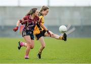28 March 2015; Grace Ni She, Coláiste Íosagáin SS, Stillorgan, in action against Niamh McConnell, Loreto Omagh. TESCO All Ireland PPS Junior A Final, Coláiste Íosagáin S.S. Stillorgan, Dublin v Loreto Omagh, Tyrone. Inniskeen, Co. Monaghan. Picture credit: Oliver McVeigh / SPORTSFILE