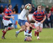 28 March 2015; Graham Lawlor, Cork Constitution, is tackled by Sam Cronin, Clontarf, Ulster Bank League, Division 1A, Clontarf v Cork Constitution. Castle Avenue, Clontarf, Co. Dublin. Picture credit: Ray Lohan / SPORTSFILE