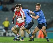 28 March 2015; Benny Heron, Derry, in action against John Small and Jonny Cooper, right, Dublin. Allianz Football League, Division 1, Round 6, Dublin v Derry. Croke Park, Dublin. Picture credit: Ray McManus / SPORTSFILE