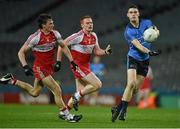 28 March 2015; Diarmuid Connolly, Dublin, in action against Kevin Johnston, left, and Conor McAtamney, Derry. Allianz Football League, Division 1, Round 6, Dublin v Derry. Croke Park, Dublin. Picture credit: Ray McManus / SPORTSFILE