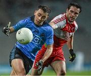 28 March 2015; Cormac Costello, Dublin, in action against Oisin Duffy, Derry. Allianz Football League, Division 1, Round 6, Dublin v Derry. Croke Park, Dublin. Picture credit: Ray McManus / SPORTSFILE
