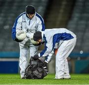 28 March 2015; With no 'ball boys' in attendance two umpires gather the footballs after the game.  Allianz Football League, Division 1, Round 6, Dublin v Derry. Croke Park, Dublin. Picture credit: Ray McManus / SPORTSFILE