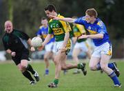 5 April 2008; Shane Enright, Kerry, is tackled by Richard Byan, Tipperary. Cadbury's Munster U21 Football Championship Final, Tipperary v Kerry, Ardfinnan, Co. Tipperary. Picture credit: Matt Browne / SPORTSFILE