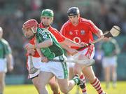 6 April 2008; Andrew O'Shaughnessy, Limerick, in action against Brian Murphy, centre, and John Gardiner, Cork. Allianz National Hurling League, Quarter-Final, Limerick v Cork, The Gaelic Grounds, Limerick. Picture credit: David Maher / SPORTSFILE
