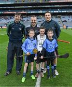 28 March 2015; The Limerick and Dublin captains, Dónal O’Grady and Liam Rushe, with referee Diarmuid Kirwan, young referee Mark Connellan, St Patrick's NS, Diswellstown, and mascots Conor Newton, left, aged 9, and his St Fiachra's N.S. colleague Cillian Keegan, aged 9, before the game. Allianz Hurling League, Division 1, Quarter-Final, Dublin v Limerick. Croke Park, Dublin. Picture credit: Ray McManus / SPORTSFILE