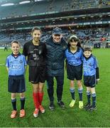 m28 March 2015; Dublin managerJim Gavin introduces himself to mascots Daniel Sheridan, Scoil Mhuire, Howth, Clodagh McCahey, Gael Scoil Chnoc Lamhna, Knocklyon, and Sean McCabe, Gael Scoil Míde, Kilbarrack, and young referee Jasmin Kamtoh, Holy Trinity, NS, second left,  before the game. Allianz Football League, Division 1, Round 6, Dublin v Derry. Croke Park, Dublin. Picture credit: Ray McManus / SPORTSFILE