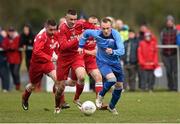 29 March 2015; Adam Beary, North End Utd, in action against Shane Guerin, Moyross Utd . Aviva FAI Junior Cup, Quarter-Final, Moyross Utd v North End Utd. Moyross, Limerick. Picture credit: Diarmuid Greene / SPORTSFILE