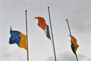 29 March 2015; The Tricolour, Clare and Kilkenny flags fly at 'half mast' in memory of two Kilkenny greats Claus Dunne and Msgr. Tommy Maher who died recently.  Allianz Hurling League, Division 1A, Relegation Play-off, Kilkenny v Clare. Nowlan Park, Kilkenny. Picture credit: Ray McManus / SPORTSFILE
