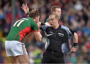29 March 2015; Mayo's Aidan O'Shea remonstrates with referee Eddie Kinsella. Allianz Football League, Division 1, Round 6, Cork v Mayo. Páirc Uí Rinn, Cork. Picture credit: Matt Browne / SPORTSFILE