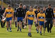 29 March 2015; Clare players, including Seadna Morey and Cathal O'Connell, leave the field after the game. Allianz Hurling League, Division 1A, Relegation Play-off, Kilkenny v Clare. Nowlan Park, Kilkenny. Picture credit: Ray McManus / SPORTSFILE