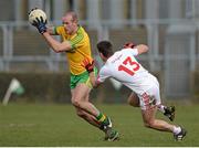 29 March 2015; Neil Gallagher, Donegal, in action against Darren McCurry, Tyrone. Allianz Football League, Division 1, Round 6, Donegal v Tyrone. MacCumhail Park, Ballybofey, Co. Donegal. Picture credit: Oliver McVeigh / SPORTSFILE