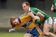 29 March 2015; Padraic Collins, Clare, in action against Seanie Buckley, Limerick. Allianz Football League, Division 3, Round 6, Limerick v Clare. Newcastlewest, Co. Limerick. Picture credit: Diarmuid Greene / SPORTSFILE