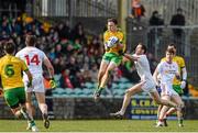 29 March 2015; Martin McElhinney, Donegal, in action against Ronan McNabb, Tyrone. Allianz Football League, Division 1, Round 6, Donegal v Tyrone. MacCumhail Park, Ballybofey, Co. Donegal. Picture credit: Oliver McVeigh / SPORTSFILE