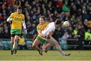 29 March 2015; Sean Cavanagh, Tyrone, is tackled by Michael Murphy, Donegal. Murphy subsequently received a black card for this challenge. Allianz Football League, Division 1, Round 6, Donegal v Tyrone. MacCumhail Park, Ballybofey, Co. Donegal. Picture credit: Oliver McVeigh / SPORTSFILE