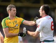 29 March 2015; Christy Toye, Donegal, tussles with Justin McMahon, Tyrone. Allianz Football League, Division 1, Round 6, Donegal v Tyrone. MacCumhail Park, Ballybofey, Co. Donegal. Picture credit: Oliver McVeigh / SPORTSFILE