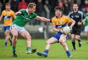 29 March 2015; Keelan Sexton, Clare, in action against Darragh Tracey, Limerick. Allianz Football League, Division 3, Round 6, Limerick v Clare. Newcastlewest, Co. Limerick. Picture credit: Diarmuid Greene / SPORTSFILE