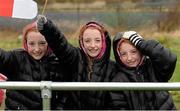 29 March 2015; Moyross Utd supporters, and triplets, from left to right, Katelyn, Simone and Morgan Reddan, all aged 9, from Moyross. Aviva FAI Junior Cup, Quarter-Final, Moyross Utd v North End Utd. Moyross, Limerick. Picture credit: Diarmuid Greene / SPORTSFILE