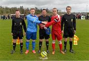 29 March 2015; North End Utd captain Paul Murphy and Moyross Utd captain Keith Colbert exchange pendants and a handshake in the company of match officials, from left to right, assistant referee Noel Purcell, referee Gary Fitzgerald, and assistant referee Richie Brazil, before the game. Aviva FAI Junior Cup, Quarter-Final, Moyross Utd v North End Utd. Moyross, Limerick. Picture credit: Diarmuid Greene / SPORTSFILE