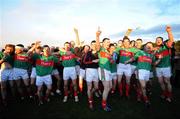 9 April 2008; Mayo players celebrate at the end of the game after victory over Roscommon. Cadbury U21 Football Championship Final, Roscommon v Mayo, Kiltoom, Co. Roscommon. Picture credit: David Maher / SPORTSFILE