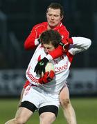 5 April 2008; Dermot Carlin, Tyrone, in action against Barry McGoldrick, Derry. Allianz National Football League, Division 1, Round 6, Derry v Tyrone, Celtic Park, Derry. Picture credit: Oliver McVeigh / SPORTSFILE