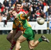 13 April 2008; Conall Dunne, Donegal, in action against Kevin McGuckin, Derry. Allianz National Football League, Division 1, Round 7, Donegal v Derry, McDonnell Park, Letterkenny, Co. Donegal. Picture credit: Oliver McVeigh / SPORTSFILE