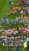 30 March 2015; A general view of children parading around the pitch at Croke Park, led by the Artane Band, during the opening day of the National Go Games. Croke Park, Dublin Picture credit: David Maher / SPORTSFILE