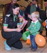 30 March 2015; Ireland's bronze medallist Katie-George Dunlevy, Maidenhead, Great Britain, with her cousin Tadhg Finn pictured on the teams arrival home after the 2015 UCI Para-cycling Track World Championships in The Netherlands. Dublin Airport, Dublin. Picture credit: Pat Murphy / SPORTSFILE