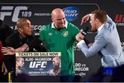 31 March 2015; UFC featherweight Conor McGregor, right, is restrained by UFC President Dana White from UFC featherweight Champion Jose Aldo during a fan event. The Convention Centre Dublin, Spencer Dock, North Wall Quay, Dublin. Picture credit: Ramsey Cardy / SPORTSFILE