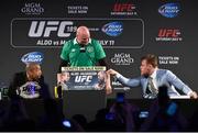 31 March 2015; UFC featherweight Champion Jose Aldo, left, UFC President Dana White, centre, and UFC featherweight Conor McGregor during a fan event. The Convention Centre Dublin, Spencer Dock, North Wall Quay, Dublin. Picture credit: Ramsey Cardy / SPORTSFILE