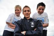 9 April 2008; At the launch of the 2008 Danone Nations Cup is Ireland's &quot;Godfather&quot; Kevin Doyle with Robert Martin, age 11, left, and Shane Howard, age 11. The Danone Nations Cup is  is the world's top football tournament for children aged 10-12. This years World Finals will see over 600 players from the 40 participating countries come together in Parc De Prince, Paris from the 5-7th September. The event is based on four fundamental values: openness, pleasure of the game, fair-play and accessibility. This years World finals take place in Parc De Prince Paris in September. Ireland's National Final takes place in June. Oscar Traynor Complex, Oscar Traynor Road, Coolock, Dublin. Picture credit: Brian Lawless / SPORTSFILE