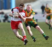 13 April 2008; Gerard O'Kane, Derry, in action against Brian Roper, Donegal. Allianz National Football League, Division 1, Round 7, Donegal v Derry, McDonnell Park, Letterkenny, Co. Donegal. Picture credit: Oliver McVeigh / SPORTSFILE