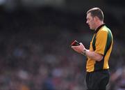 13 April 2008; Referee James Owens takes the name of a player in his book. Allianz National Hurling League, Division 1, semi-final, Cork v Galway, Gaelic Grounds, Limerick. Picture credit: Brendan Moran / SPORTSFILE