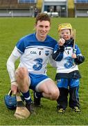29 March 2015; JJ Flanagan, aged 4, from Tramore, Co. Waterford, with Waterford's Austin Gleeson after the game. Allianz Hurling League, Division 1, Quarter-Final, Waterford v Galway. Walsh Park, Waterford. Picture credit: Piaras Ó Mídheach / SPORTSFILE