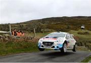3 April 2015; Craig Breen and Scott Martin, in a Peugeot 208 T16, in action during the SS2 of the Circuit of Ireland Rally 2015. Hamiltons Folly, Castlewellan, Co. Down. Picture credit: Philip Fitzpatrick / SPORTSFILE