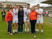 4 April 2015; Kildare players and their mothers celebrate with the cup after the game, from left, Catherine and Leo Quinn, Mary and Éanna O'Neill and Joan and Martin Fitzgerald. Allianz Hurling League Division 2B Final, Kildare v Meath. Cusack Park, Mullingar, Co. Westmeath. Picture credit: Piaras Ó Mídheach / SPORTSFILE