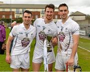 4 April 2015; Kildare players, from left, Leo Quinn, Éanna O'Neill and Martin Fitzgerald celebrate after the game. Allianz Hurling League Division 2B Final, Kildare v Meath. Cusack Park, Mullingar, Co. Westmeath. Picture credit: Piaras Ó Mídheach / SPORTSFILE