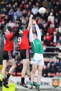 20 April 2008; Martin McGrath, Fermanagh, in action against Peter Turley and Dan Gordon, 9, Down. Allianz National Football League, Division 3, Round 7, Down v Fermanagh, Pairc Esler, Newry, Co. Down. Picture credit: Matt Browne / SPORTSFILE *** Local Caption ***