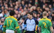 20 April 2008; Referee Paddy Russell, shows the red card to players, left to right, Shane McAnarney, Meath, Paddy Andrews, Dublin, Niall McKeigue, Meath and Bernard Brogan, Dublin, out of picture, during the first half. Allianz National Football League, Division 2, Round 7, Dublin v Meath, Parnell Park, Dublin. Picture credit: David Maher / SPORTSFILE *** Local Caption ***