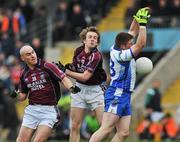 20 April 2008; Rory Woods, Monaghan, in action against Martin Flanagan, left, and Doran Harte, Westmeath. Allianz National Football League, Division 2, Round 7, Monaghan v Westmeath, St Tighearnach's Park, Clones, Co. Monaghan. Picture credit: Brian Lawless / SPORTSFILE *** Local Caption ***