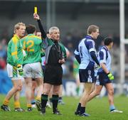 20 April 2008; Referee Paddy Russell, shows the yellow card to Tomas Quinn, Dublin. Allianz National Football League, Division 2, Round 7, Dublin v Meath, Parnell Park, Dublin. Picture credit: David Maher / SPORTSFILE *** Local Caption ***
