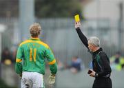 20 April 2008; Referee Paddy Russell shows the yellow card to Graham Geraghty, Meath. Allianz National Football League, Division 2, Round 7, Dublin v Meath, Parnell Park, Dublin. Picture credit: David Maher / SPORTSFILE *** Local Caption ***