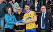 4 April 2015; Siobhan Toale, Director, EirGrid, with Alan Kelly, Eirgrid Community Liasion Officer, presents Diarmuid Murtagh, Roscommon, with the EirGrid man of the match award. Also pictured is Mick Rock, President Connacht Council. EirGrid Connacht U21 Football Championship Final, Galway v Roscommon. Tuam Stadium, Tuam, Co. Galway. Picture credit: Ray Ryan / SPORTSFILE