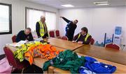5 April 2015; Presentation committee member Sean McKeown, left, Navan O'Mahonys G.A.A. Club, with 'Maors'  Peter Cassidy and James Meehan, St Michaels GFC, and Arthur Reilly, 2nd from right, Boardsmill GAA, as they prepare for the game. Allianz Football League, Division 2, Round 7, Meath v Cavan. Páirc Táilteann, Navan, Co. Meath. Picture credit: Ray McManus / SPORTSFILE